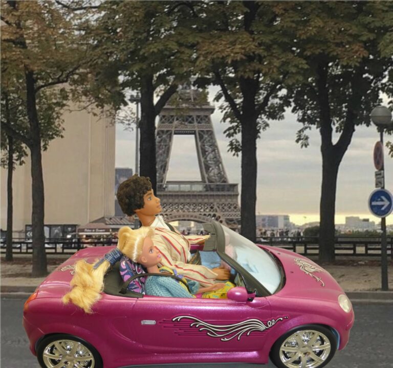 Dolls in a sports car