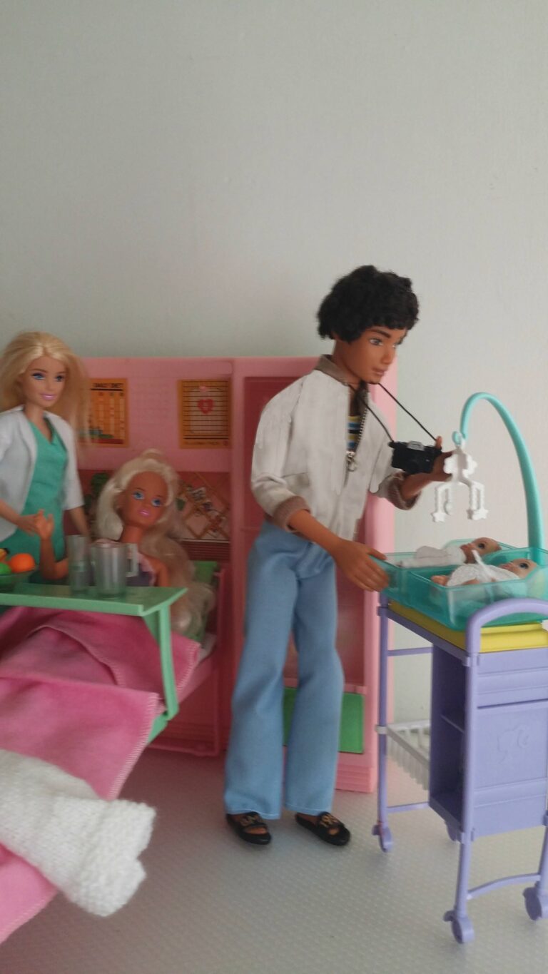 Louis takes photos of the twins