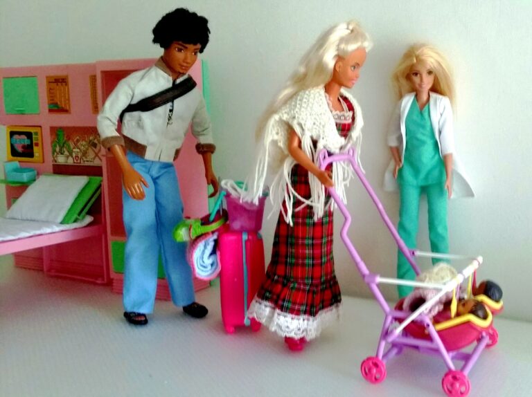 The nurse takes a last look at the twins