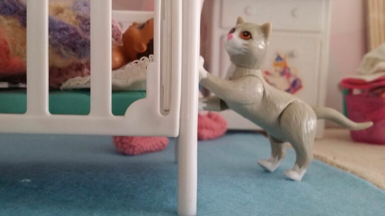Gris by baby's crib