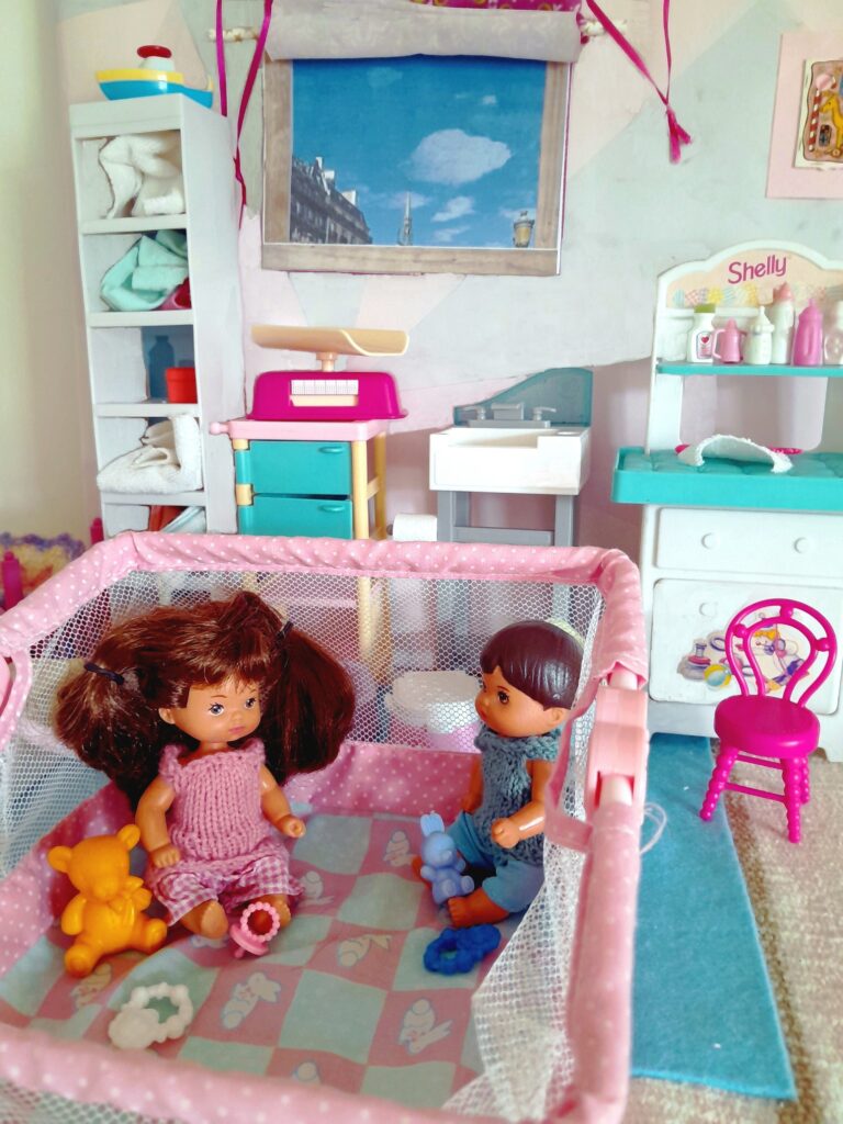 Toddlers in playpen